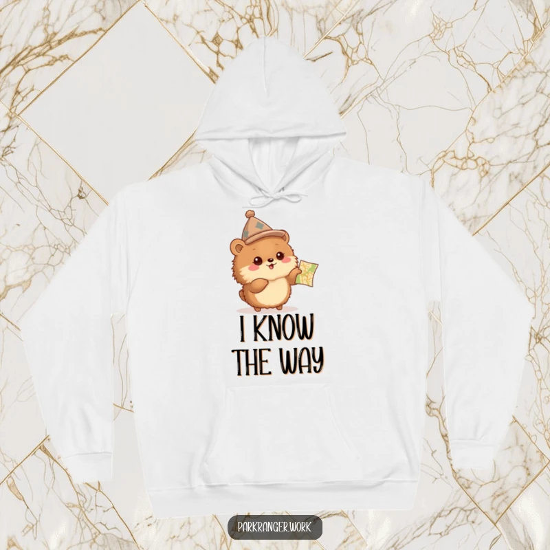 Funny Hoodie featuring a fluffy brown animal in a peaked hat, excitedly pointing at a small map, for cozy exploration.