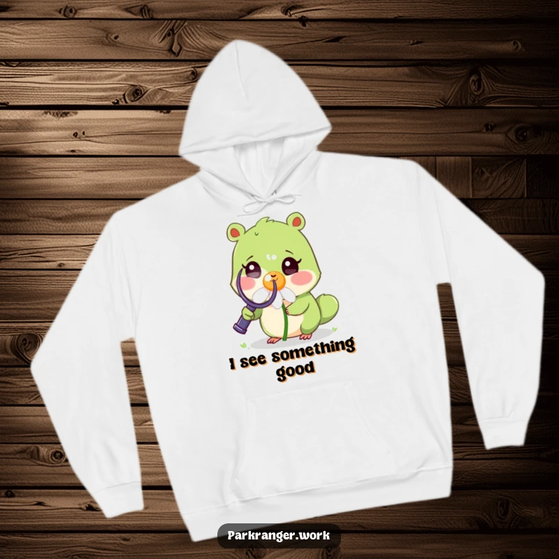 Funny Hoodie featuring a small green animal with a magnifying glass examining a cheerful, smiling daisy, perfect for cozy wear.