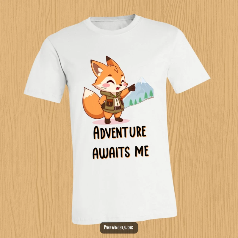 Funny Fox Ranger T-Shirt: An energetic fox sprite in a ranger vest points excitedly at a distant mountain, ready for exploration.