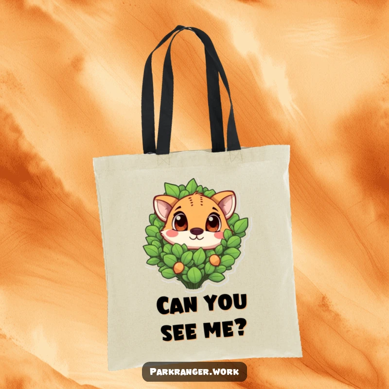 Funny animal with big, curious eyes peeking from a green plant, a durable and stylish tote bag.